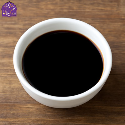 sos-soya-dark-color-in-a-white-bowl-on-wooden-surface