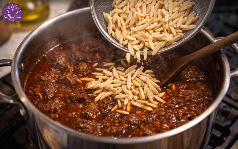 اضافه-کردن-خلال-بادام-به-خورشت-خلال-کرمانشاهی