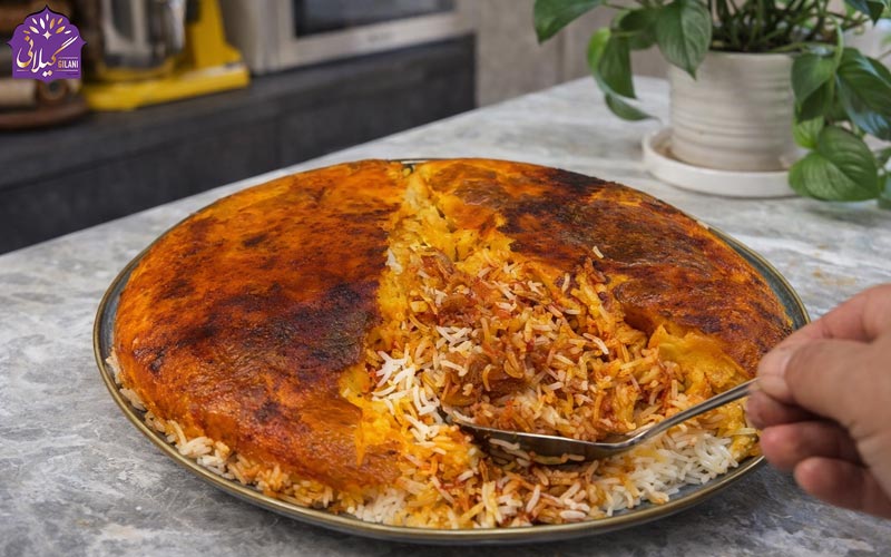 طرز تهیه پلوتن ساده با مایه گوجه ای و ته دیگ سیب زمینی